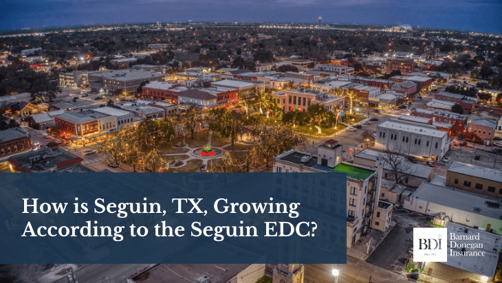 Aerial view of downtown Seguin, Texas, lit up at night, showcasing the city&rsquo;s growth and vibrant community.