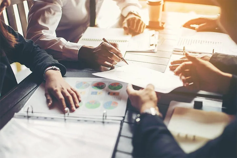 Risk Management - Group of People Gathering Together For a Business Meeting