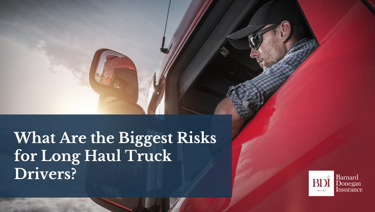 Long haul truck driver in a red truck cabin, focused on the road, with text overlay about risks for truck drivers, related to trucking and transportation safety.